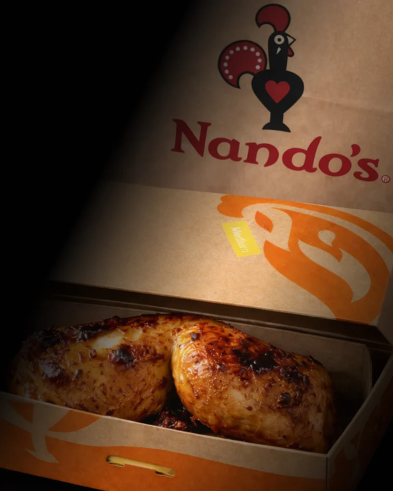 Nando's logo on a box of chicken