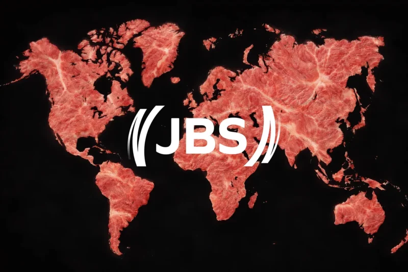 JBS logo over world map made of raw meat