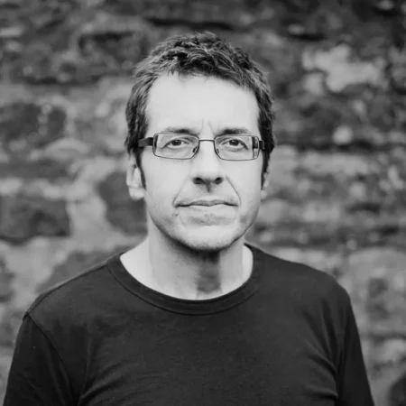 A black-and-white portrait of journalist George Monbiot