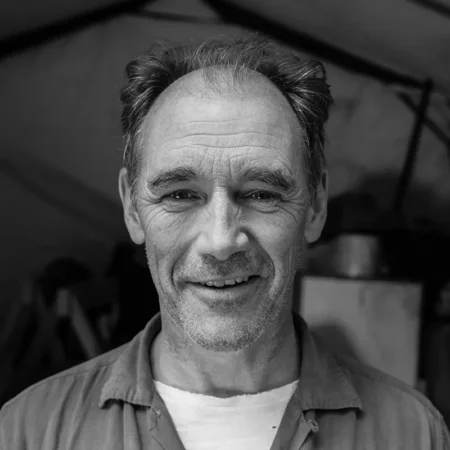 A black-and-white portrait of Sir Mark Rylance