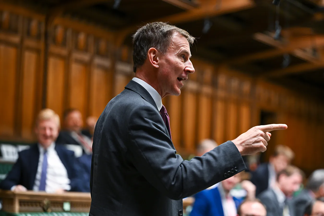 Jeremy Hunt MP speaking and pointing in House of Commons chamber